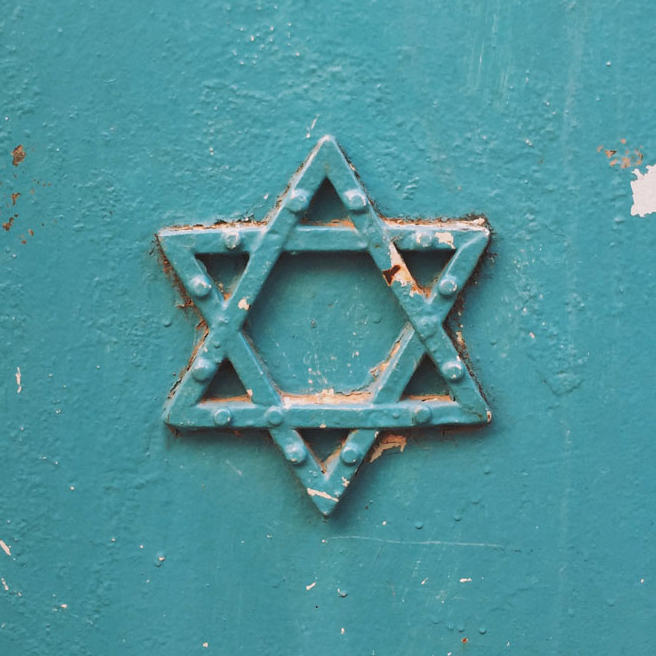 Jewish star on blue wall 