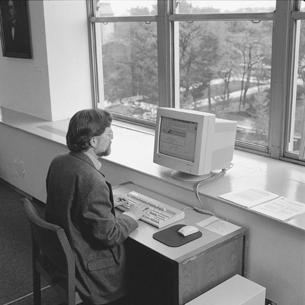 Working on the computer, in library